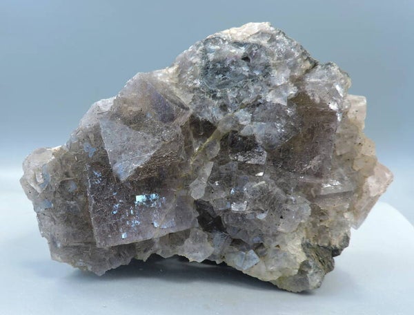 Fluorescent fluorite crystal cluster on matrix from Morocco