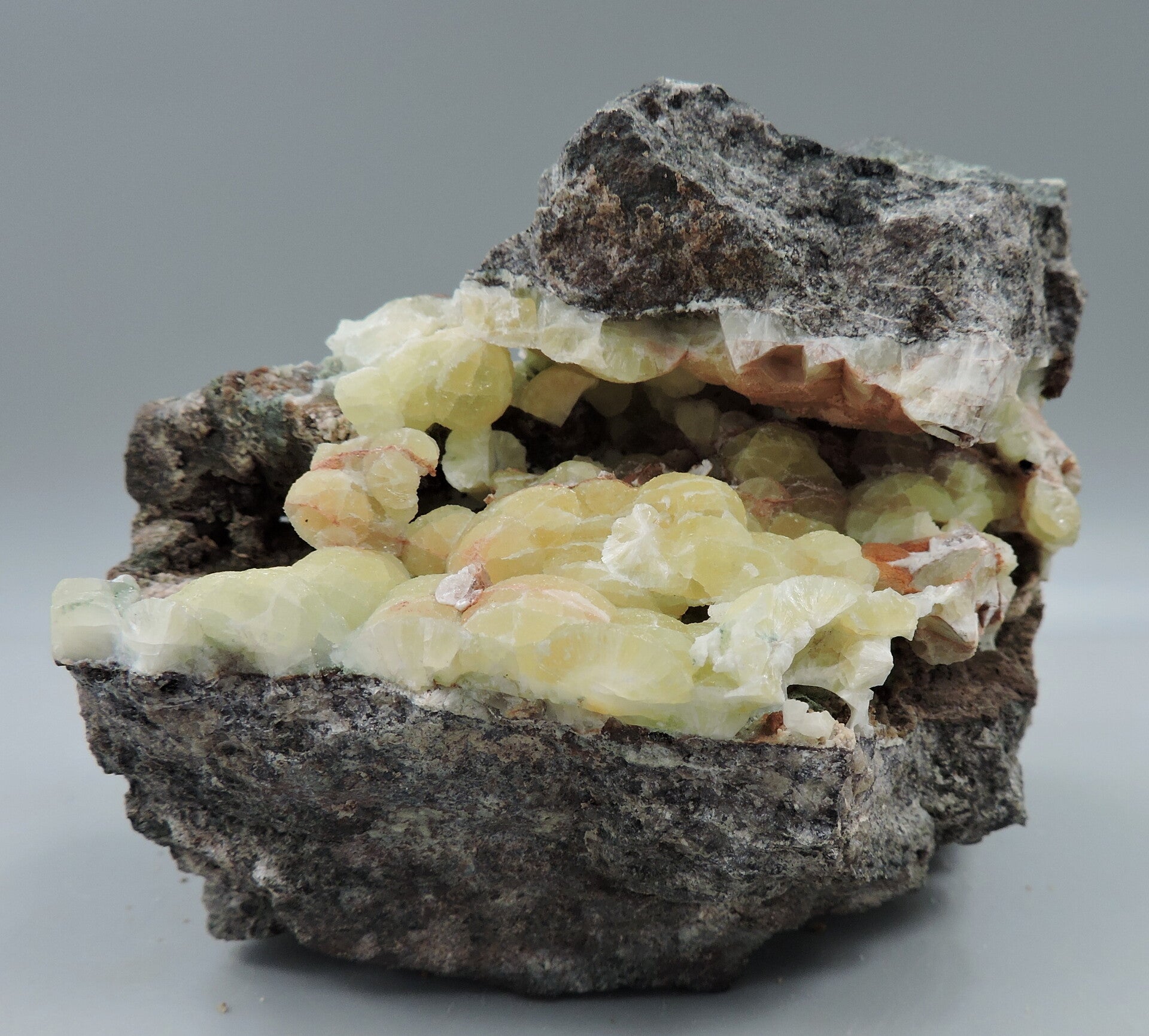 Prehnite in matrix from Germany – cabinet size