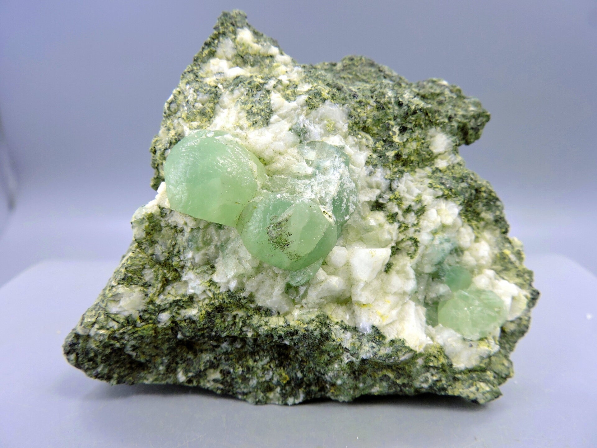 Prehnite on matrix from Australia – cabinet size