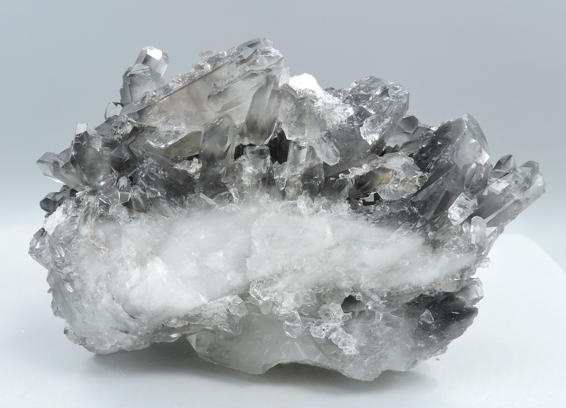 Quartz and smokey quartz crystal cluster from Pakistan – cabinet size