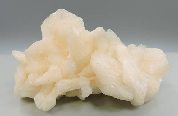 Cream white stilbite from India – cabinet size