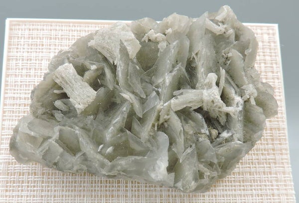 Strontianite on calcite from Germany – miniature