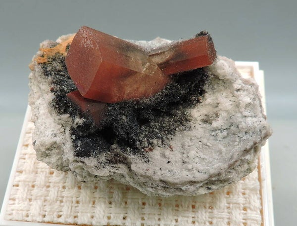 Red topaz on matrix from Mexico – miniature