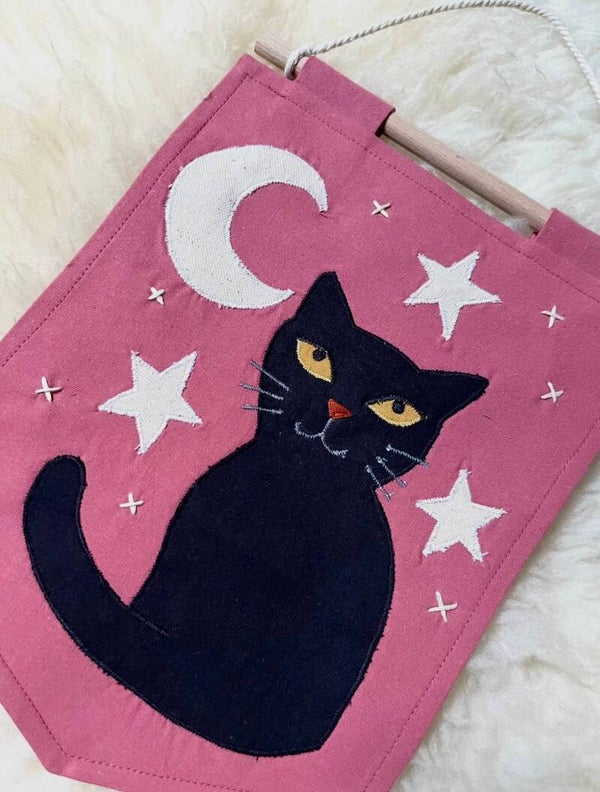 Vlaggetje: A little black cat magic