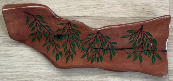 Painting on red gum.