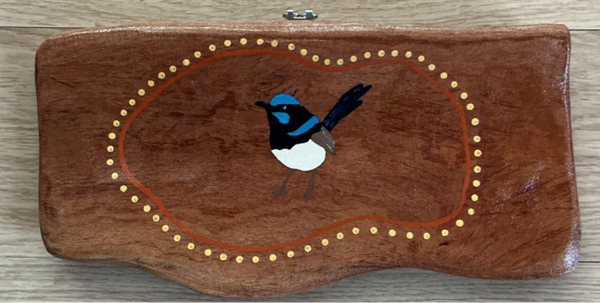 Painting on red gum.