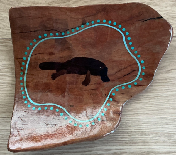 Painting on red gum.