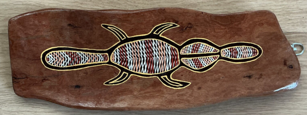 Painting on red gum.