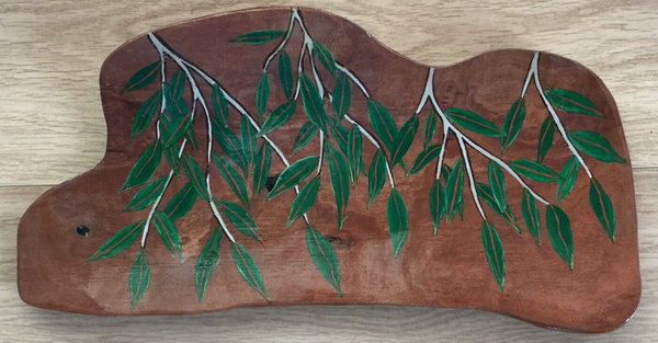 Painting on red gum.