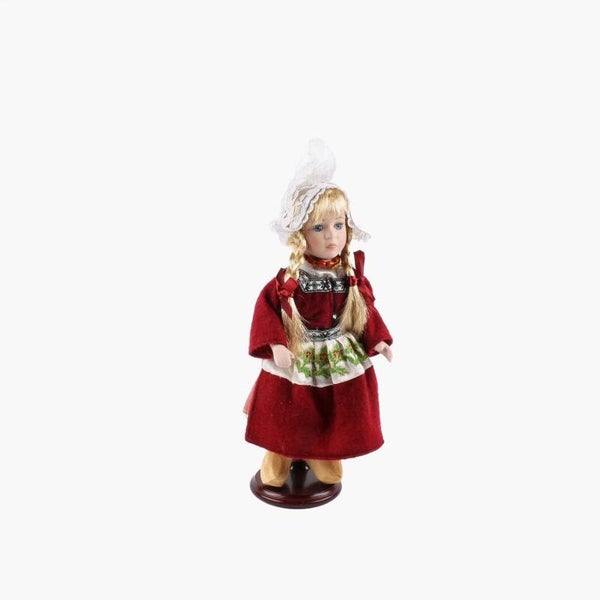 15010 - Pop porselein vrouw 26 cm - bordeaux