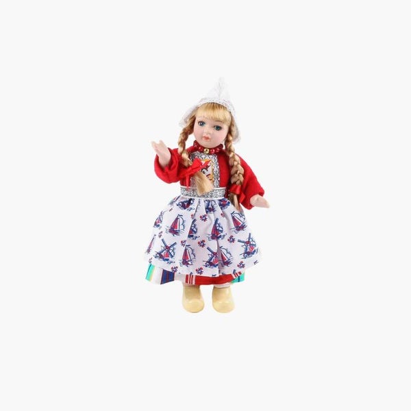 4322 - Pop porselein vrouw 17 cm - rood