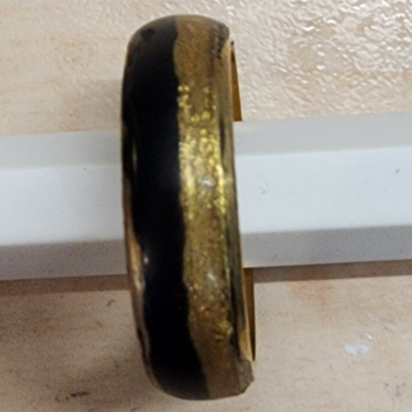 Black and gold on gold plated stainless steel