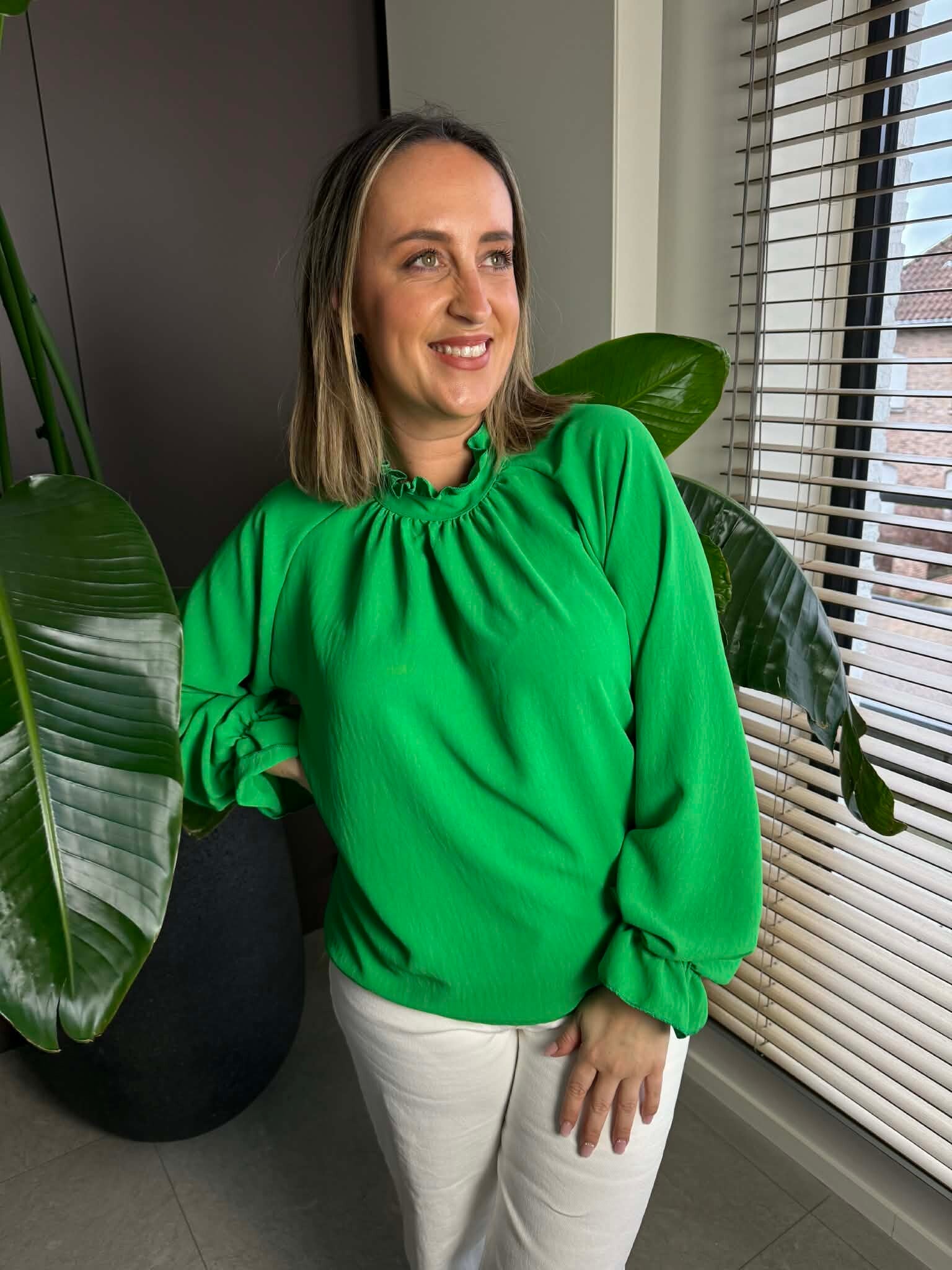 Emerald green blouse