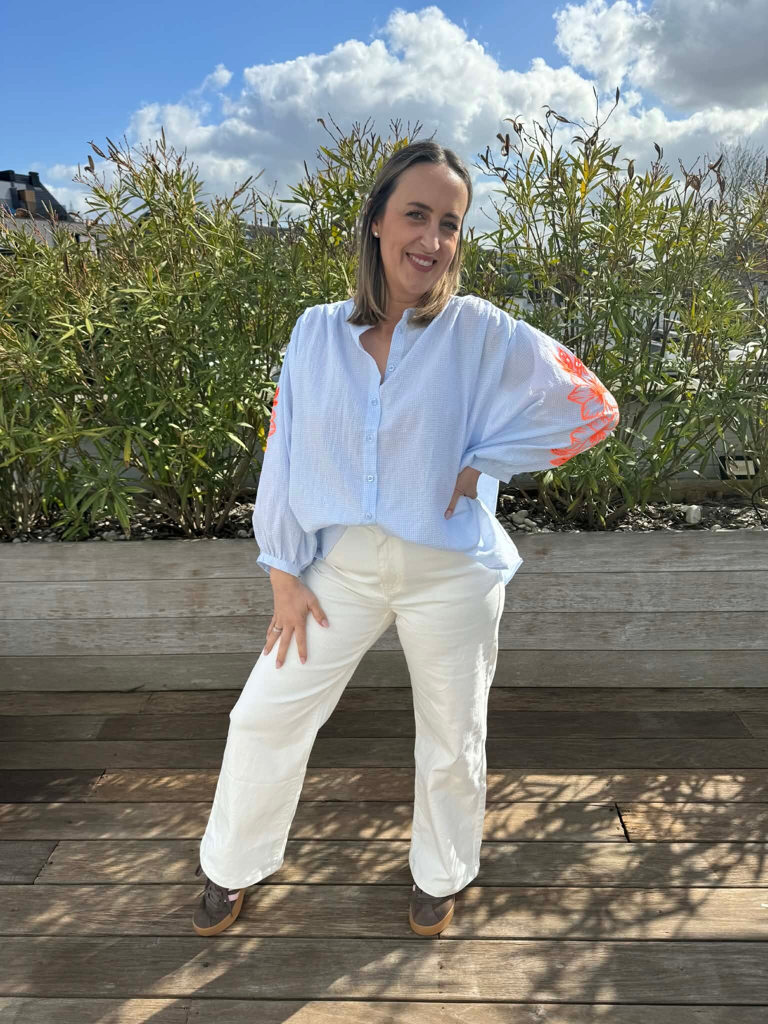 Blue blouse orange flower