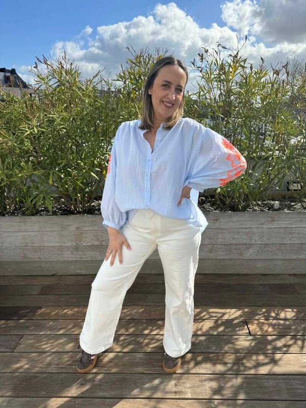 Blue blouse orange flower