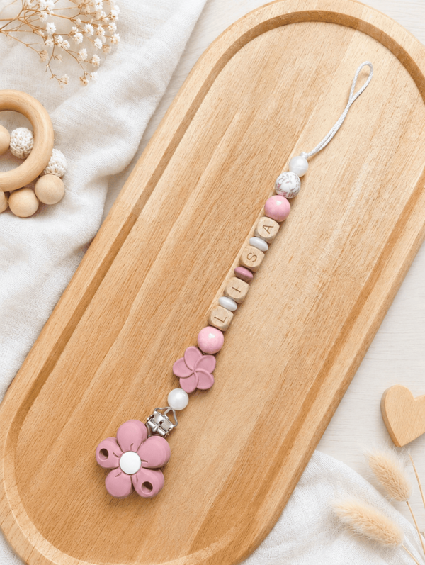 Attache tétine fleur rose