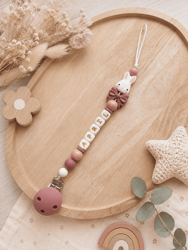 Attache tétine lapin noeud rose