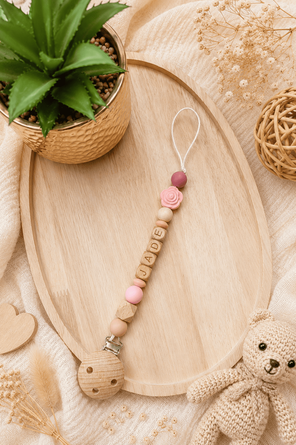 Attache tétine rose