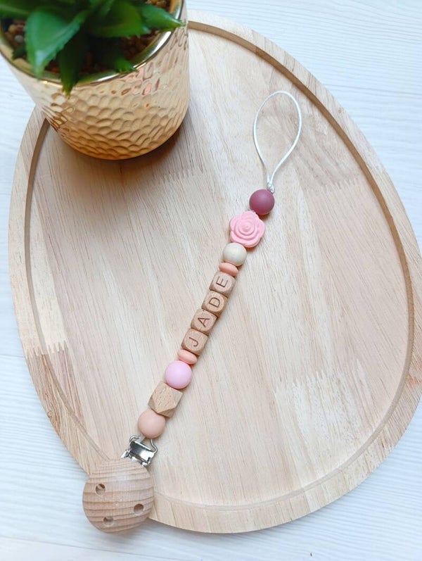 Attache tétine rose