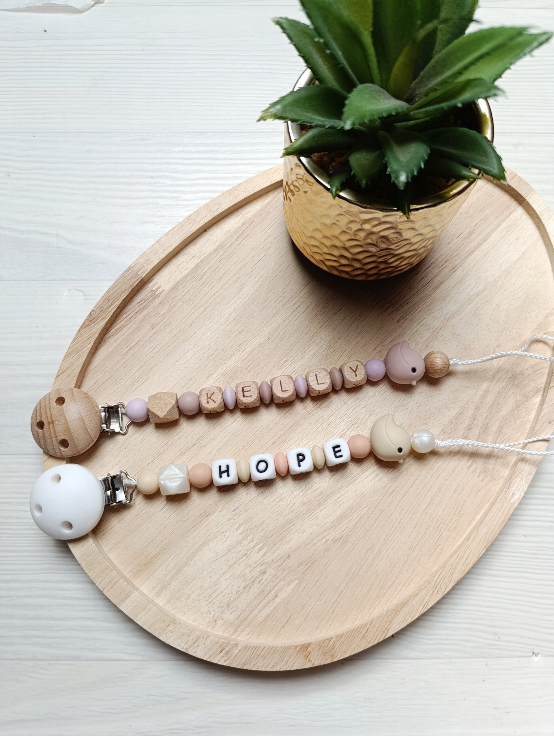 Attache tétine oiseau