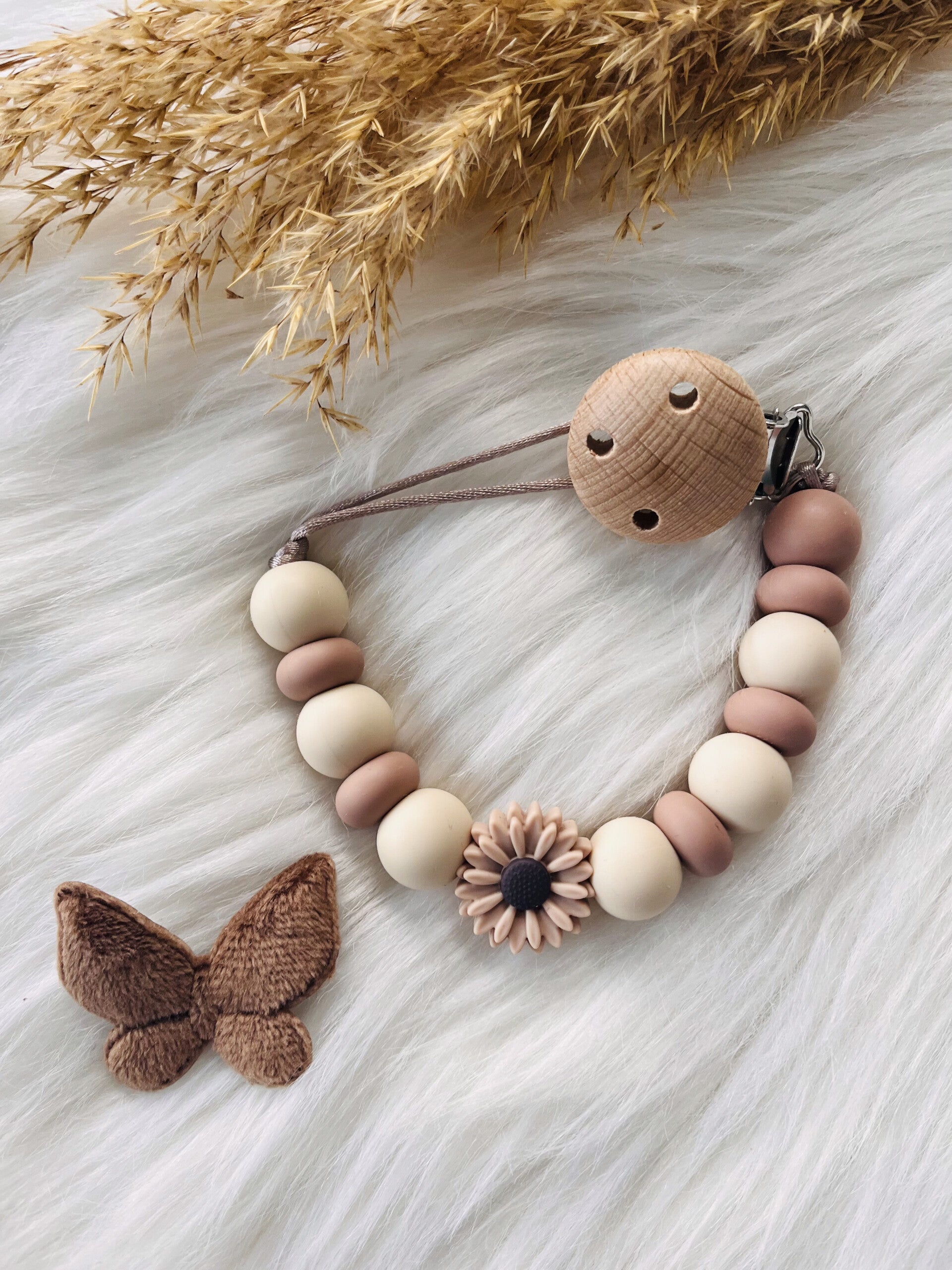 speenkoord old lace, bruine bloem