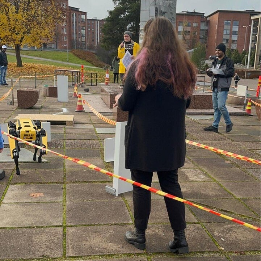 Me participanting in Robot-Dog Agility race with the Spot robot.