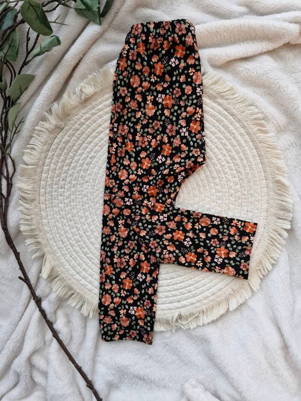 Legging 92 zwart met perzik kleurige bloemen