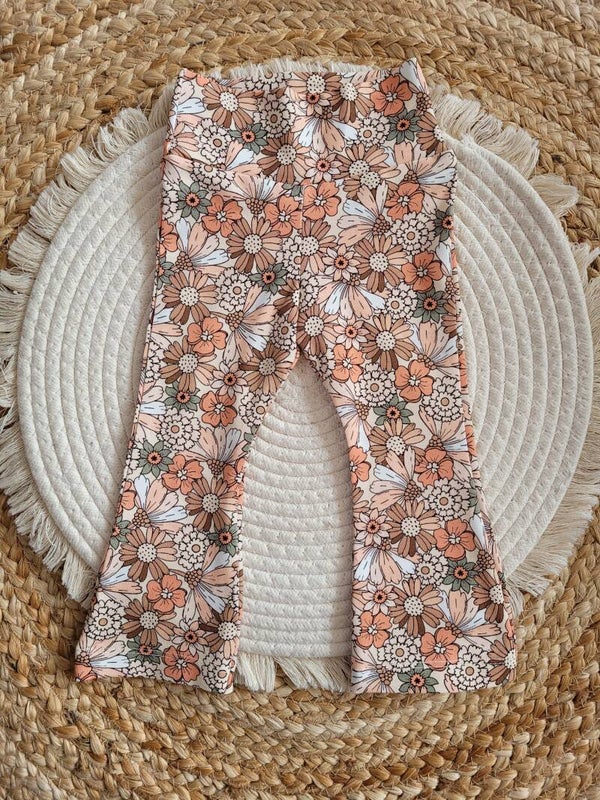 Slim flared legging vrolijke bloemen pastel