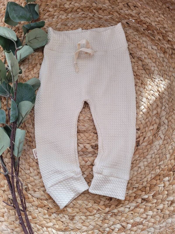 Broekje 68 cableknit tricot beige