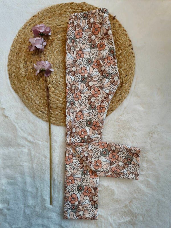 Legging 104 vrolijke bloemen perzik