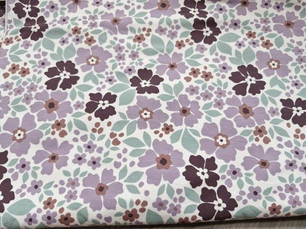 Coupon katoen tricot 1mx1.4m  paarse bloemen