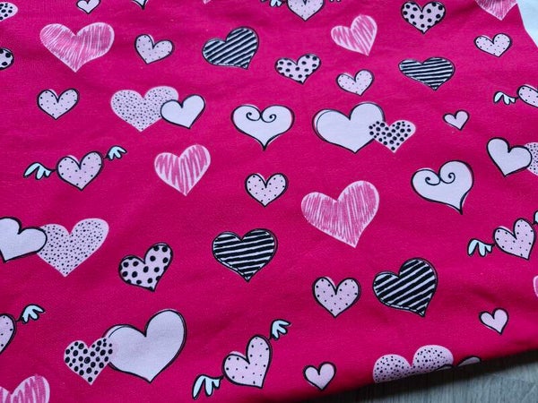 Coupon katoen tricot 1mx1.4m hartjes roze
