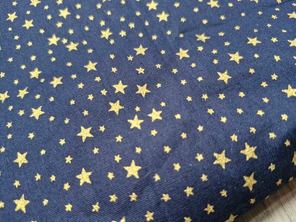 Katoen poplin blauw met gouden sterren