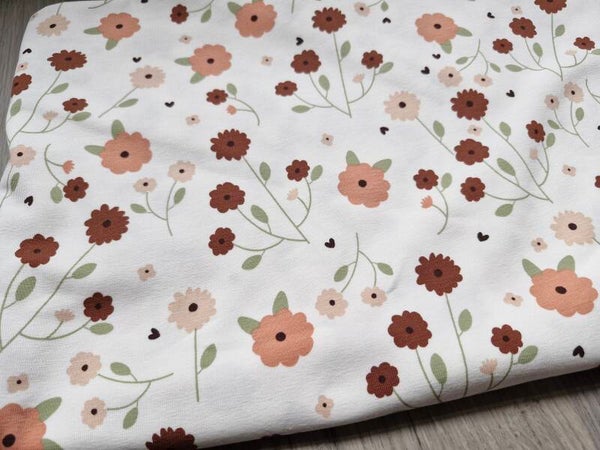 Coupon katoen tricot 1mx1.4m offwhite bloemenprint