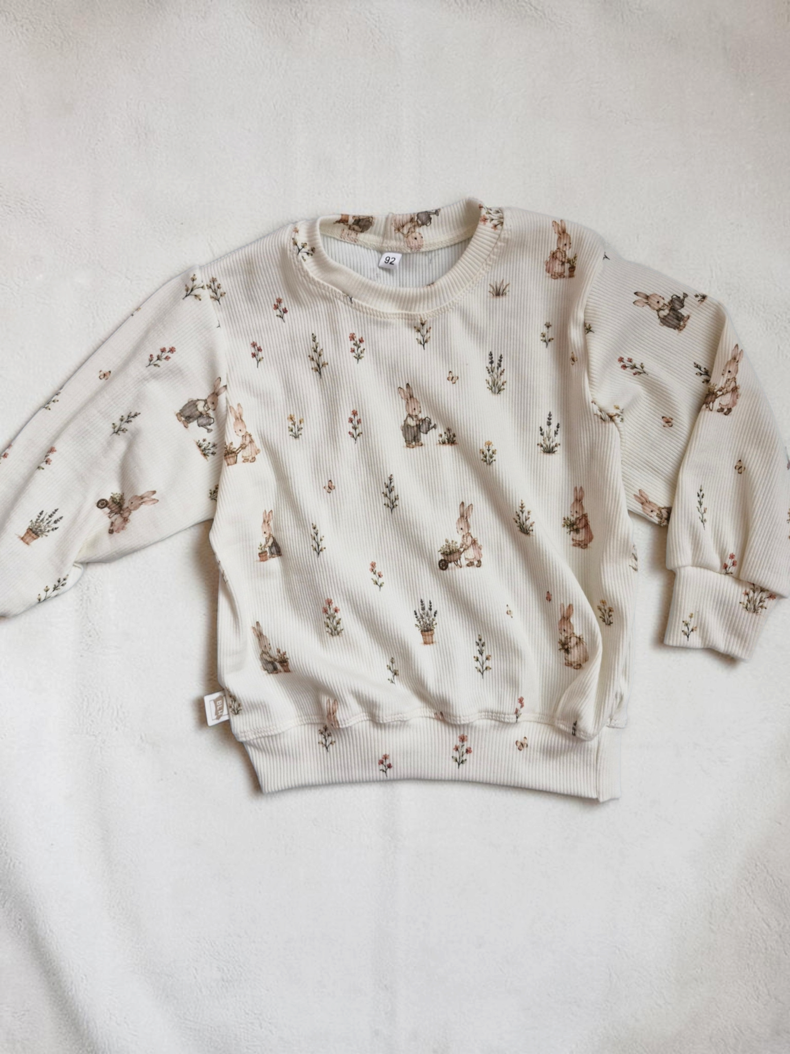 Vintage sweater 92 konijntjes in de tuin