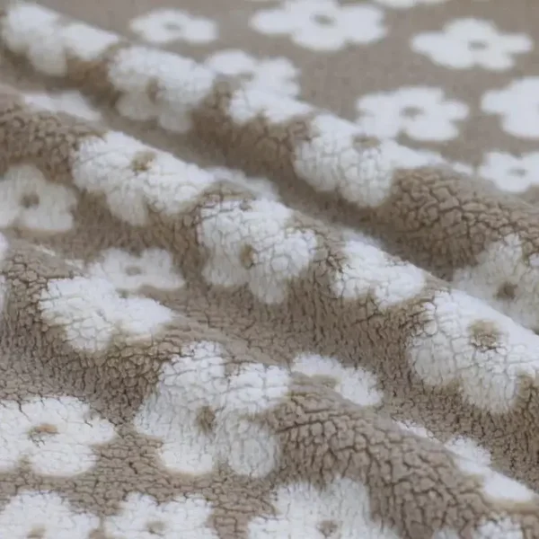 Teddy gillet beige met offwhite bloemen