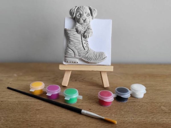 Schilder je eigen canvas: Hond in laars