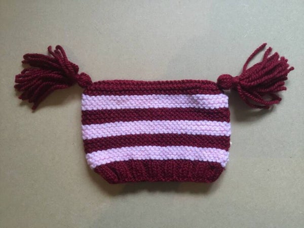 pink/red tassel hat 6-12 mths