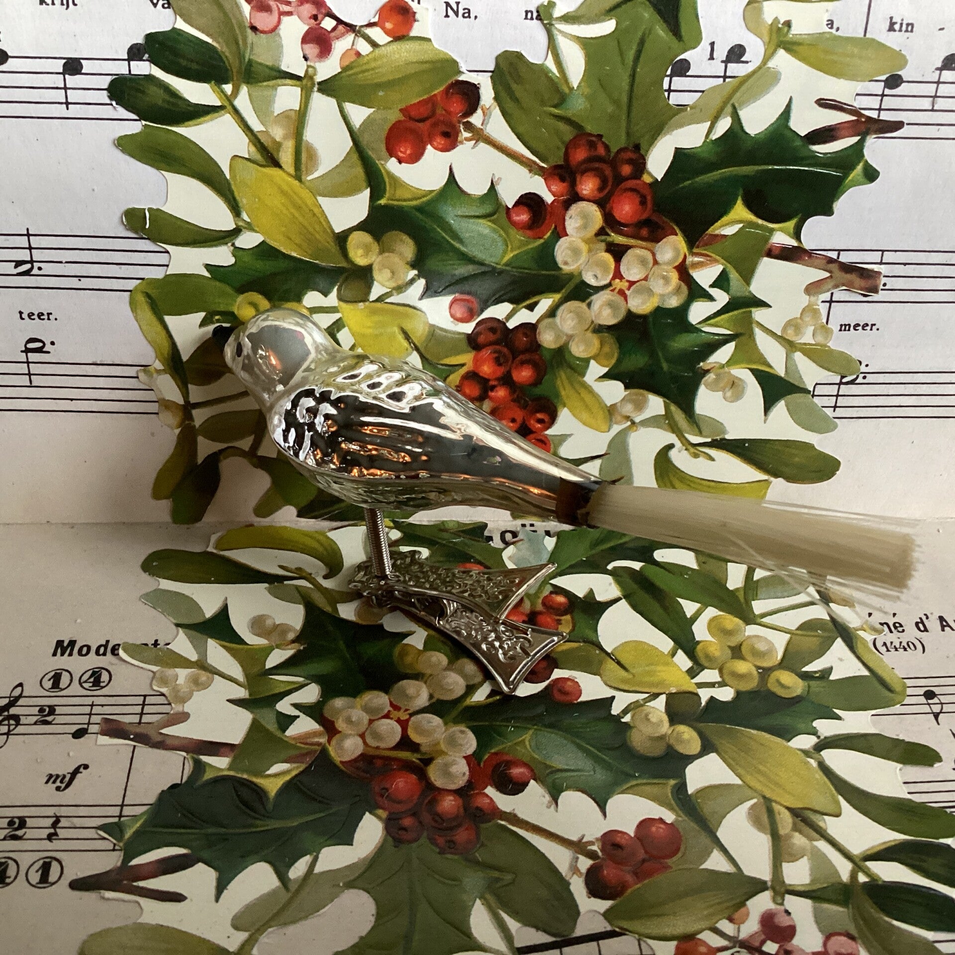 Antieke vogel op clip, fiberstaart