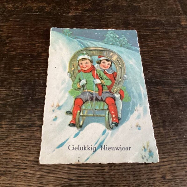 Antieke nieuwjaarskaart begin 1900