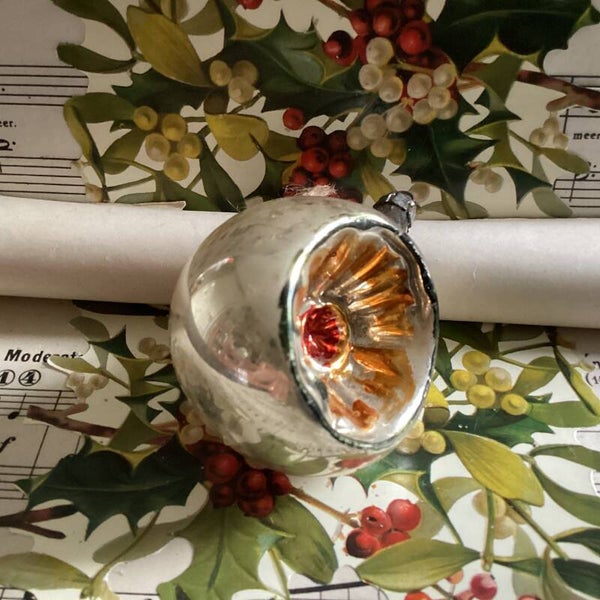 Antieke deukbal rood oranje kern groene rand, 6 cm