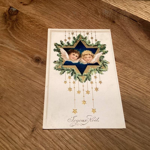 Antieke kerstkaart in reliëf uit 1907 engelen