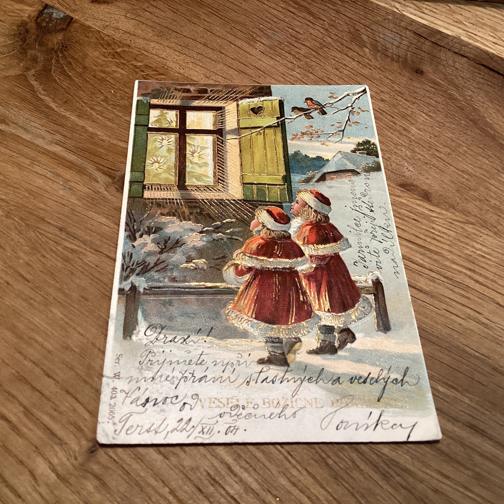 Antieke kerstkaart in reliëf uit Slovenië, begin 1900 kinderen goudaccenten