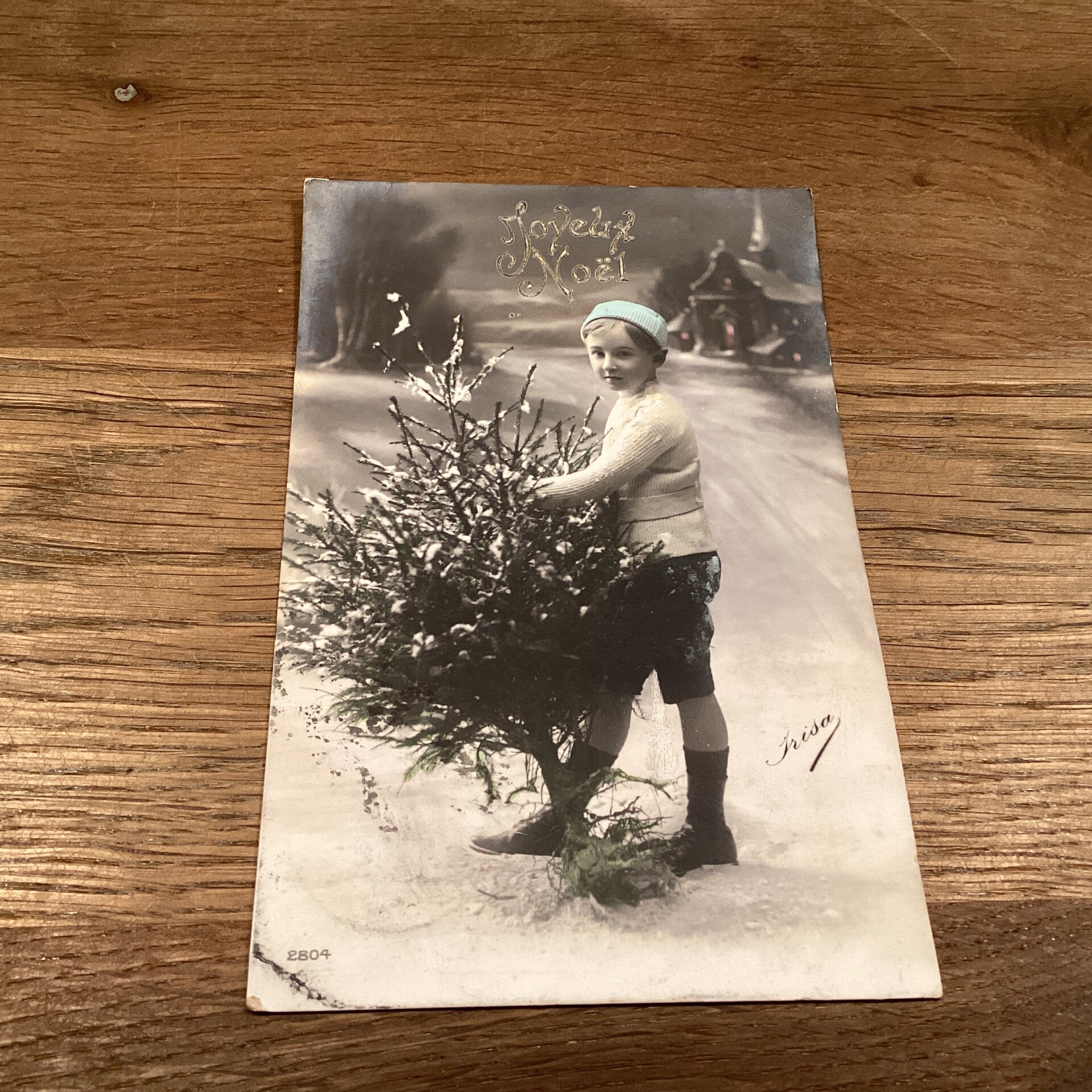 Antieke kerstkaart kind met boom, 1912