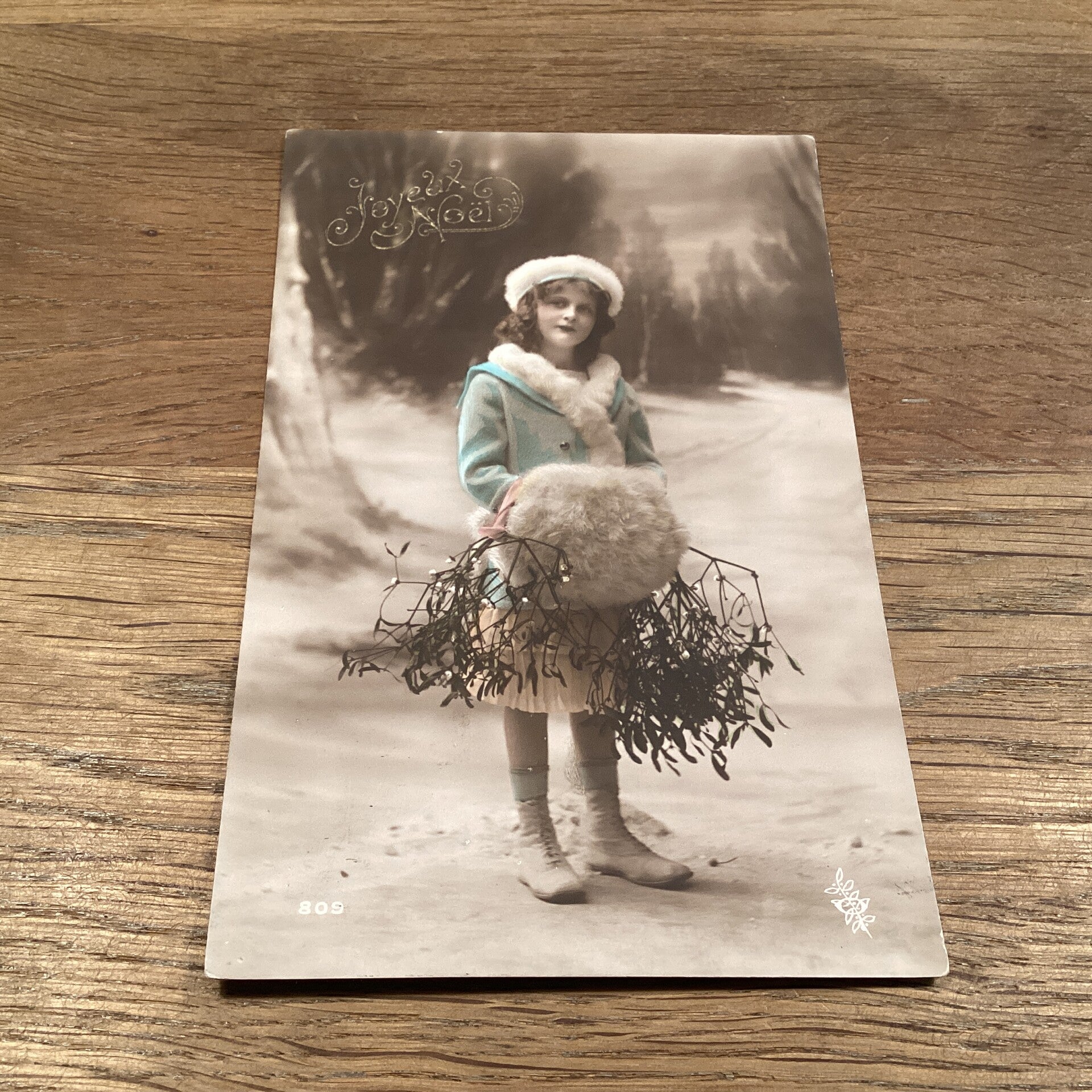 Antieke kerstkaart kind met mistletoe, 1916