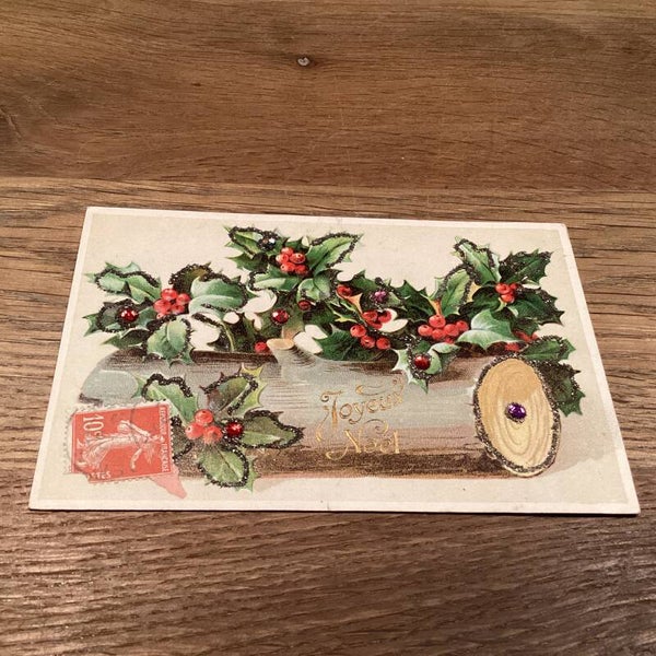 Antieke kerstkaart hulst met pailletten en zwarte glitteraccenten in reliëf, begin 1900