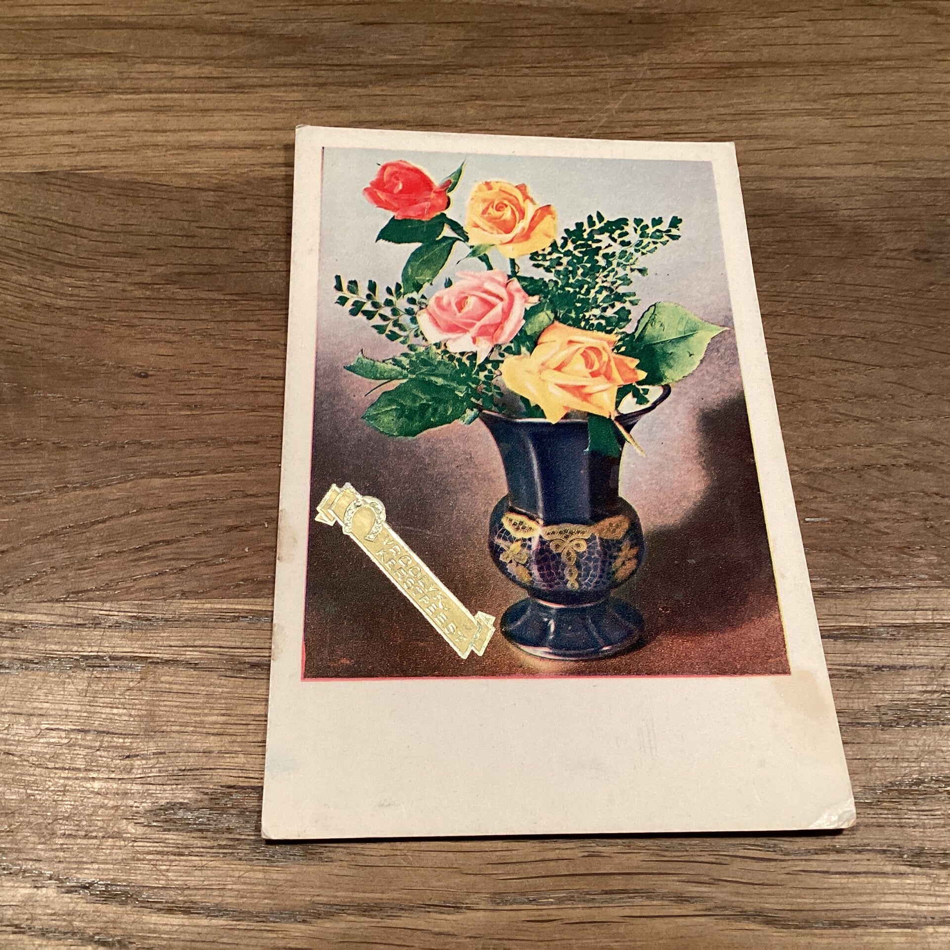 Antieke kerstkaart bloemen uit 1932