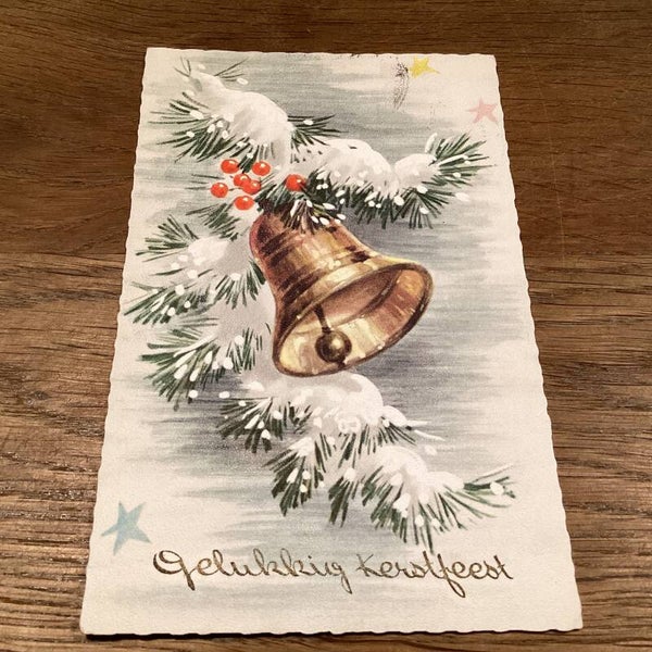 Antieke kerstkaart met klokken
