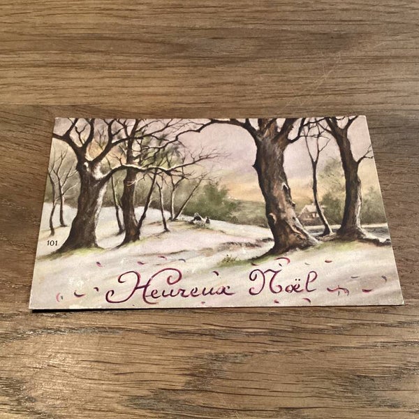 Antieke kerstkaart uit 1919 met mooi landschap en gouden rand zijkant