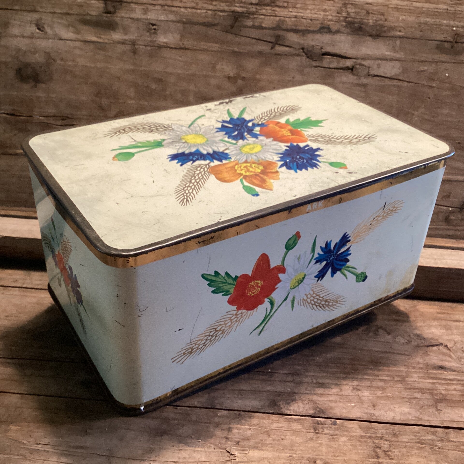 Vintage Ark blik met veldbloemen